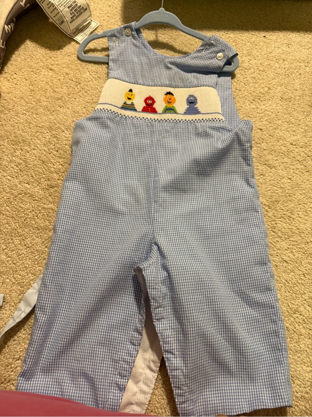 Blue Smocked One-Piece Romper with Embroidered Characters